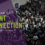 
                            Picture of people at a large tradeshow.                            