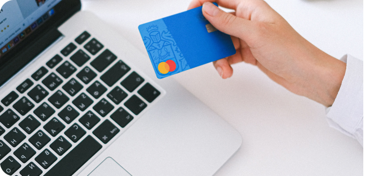 a person booking a hotel online using a credit card